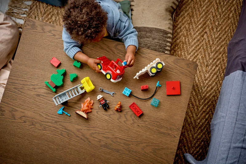 Fire Truck with Hose and Firefighter