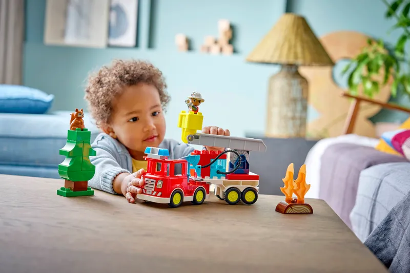 Fire Truck with Hose and Firefighter