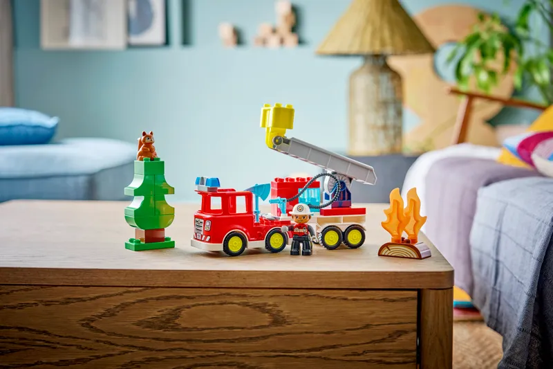 Fire Truck with Hose and Firefighter