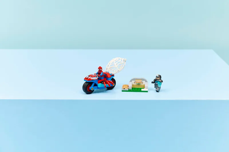 Spidey on his Motorcycle vs. Rhino