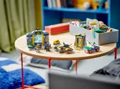 The Batcave with Batman, Batgirl and The Joker